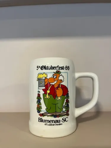 Caneco de chopp oficial da 5ª Oktoberfest Blumenau ano 1988 - porcelana Schmidt