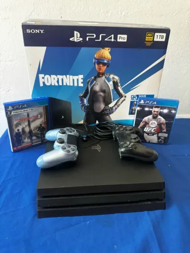 Ps4 pro 1tb , 2 controles e 2 jogos e fone da Ps4 