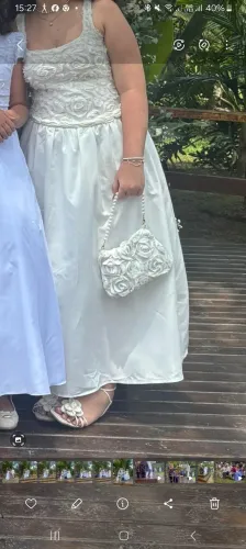 Vestido Branco lindoo detalhes floral usado uma vez , junto a uma linda bolsa branca 