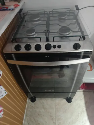 Vendo fogão Atlas Quatro bocas Acendimento automático forno em perfeitas condições