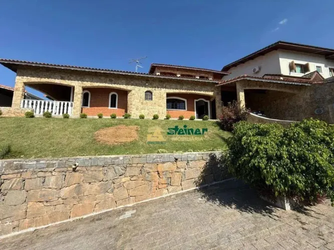 Casa com 5 dormitórios para alugar, 514 m² por R$ 14.013,41/mês - Arujá Country Club - Aru