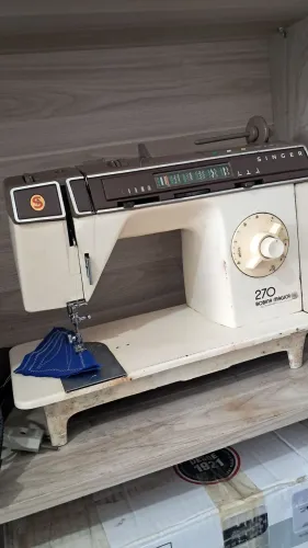 Máquina de costura singer bobina mágica