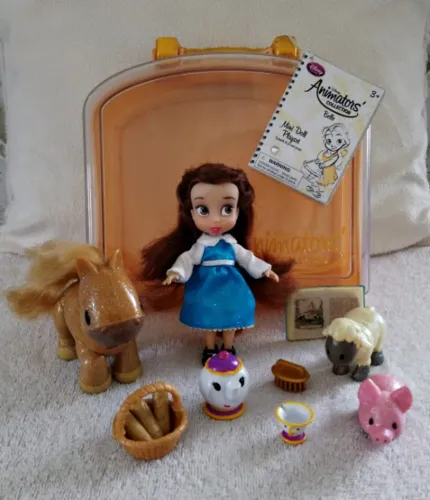 Boneca disney mini animators Bela - maleta