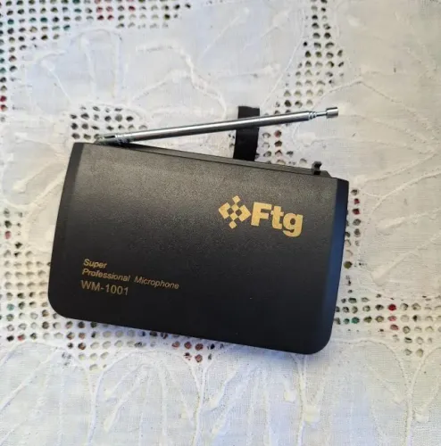 receptor de microfone sem fio da marca Ftg, modelo WM-1001. sem teste