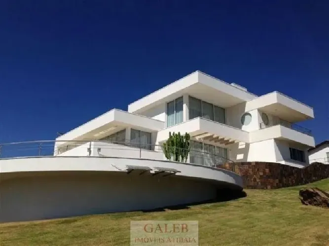 Casa de luxo em Condomínio Figueira Garden: 5 suítes, 3 salas, 7 vagas de garagem, 1.590m²