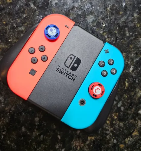 Joy cons + suporte original Nintendo 