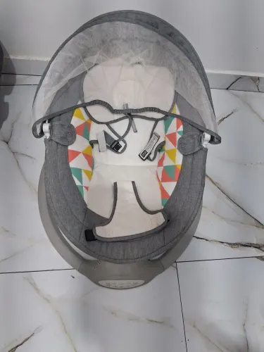 Cadeirinha de música de bebê
