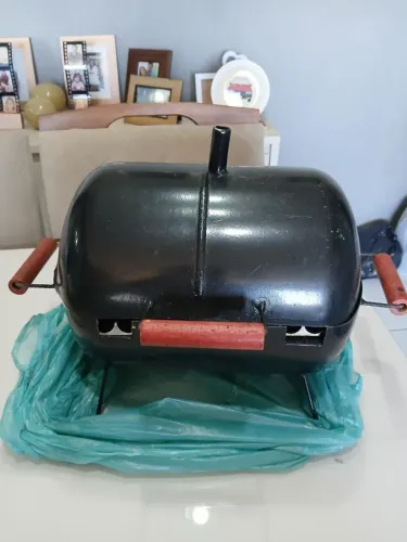 Vendo uma churrasqueira semi nova 