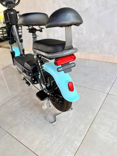 Bicicleta elétrica Luxor - com cesta e pedal - nova 