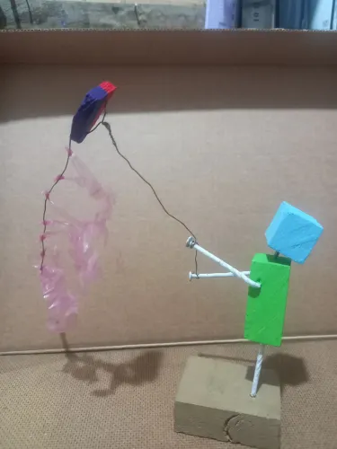 Boneco empinando pipa