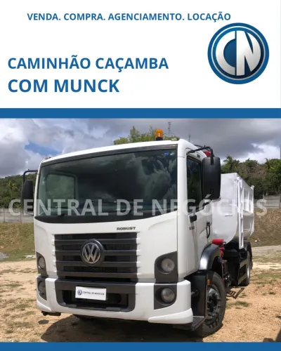 Caminhão caçamba com Munck