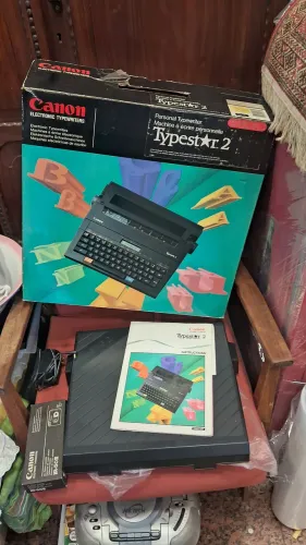 máquina de escrever eletrônica portátil Canon Typestar 2 completa