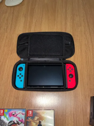Vendo Nintendo Switch V1 de 32GB bloqueado + Zelda + Splatoon 2 + Estojo e acessórios