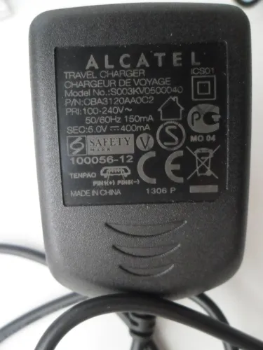 Carregador Alcatel Entrada: 100-240V ~ 50/60Hz 150mA.Saída: 5.0V --- 400mA.