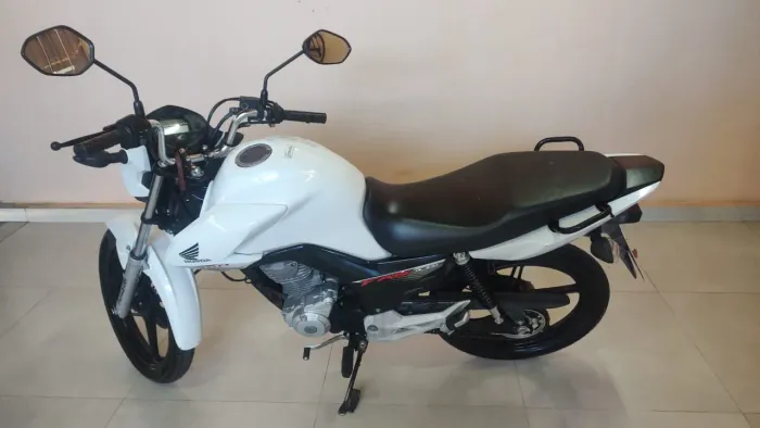 Vendo ou troco por carro ou moto financiado.