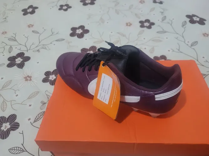 Chuteira Nike trava mista