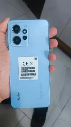 iPhone 11 e Redmi 12