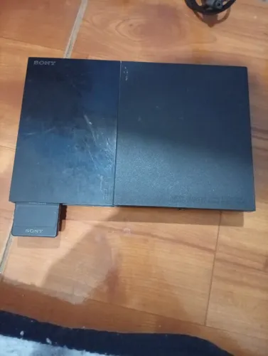 Vendo PS2 slim com 2 controles e memory card originais