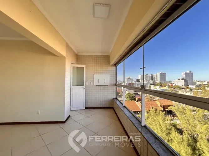 Apartamento 2 dormitórios sendo suíte para locação anual,Centro de Tramandaí.
