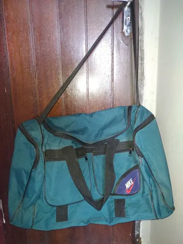 Mala de viagem verde