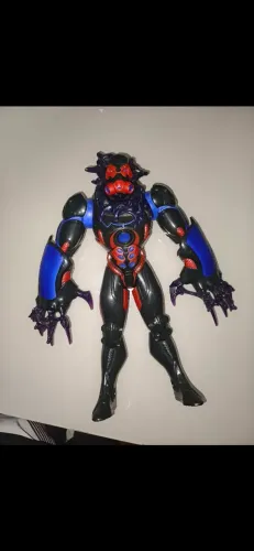 Boneco Max Steel Toxzon (Mattel) com aproximadamente 30-31 cm de altura.