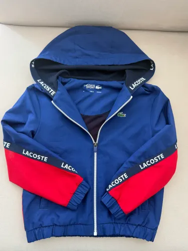 Linda jaqueta infantil corta vento Lacoste