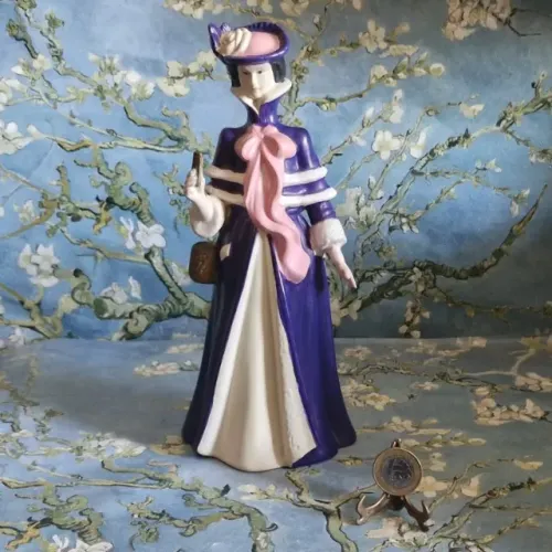 Estatueta vintage de 26 cm alt. Troféu Mrs. Albee da Avon do ano de 2009. Sem avarias.