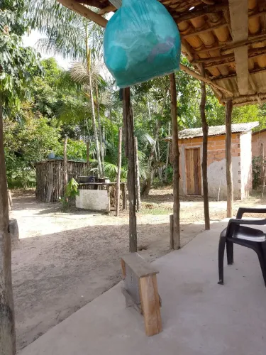 Terreno casa de barro arborizada e fruteira mede 12 frente 50 comprimento zap *21