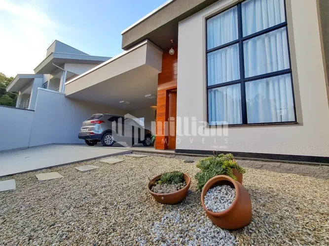 CASA COM 3 DORMITÓRIOS SENDO 1 SUÍTE NO BAIRRO SOUZA CRUZ