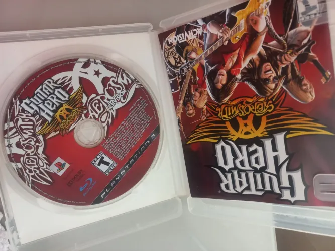 1 jogou original de guitar hero de Ps3 vai com manual