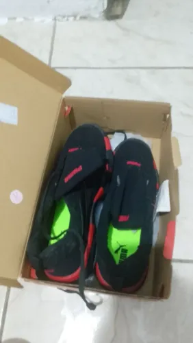 Um tênis puma bmw top