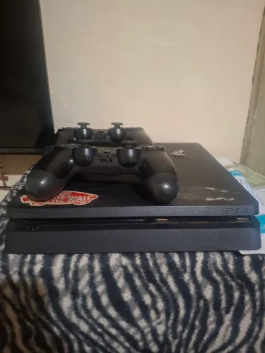 PlayStation 4 1 tera 2 controles e 8 jogos funcionando perfeitamente