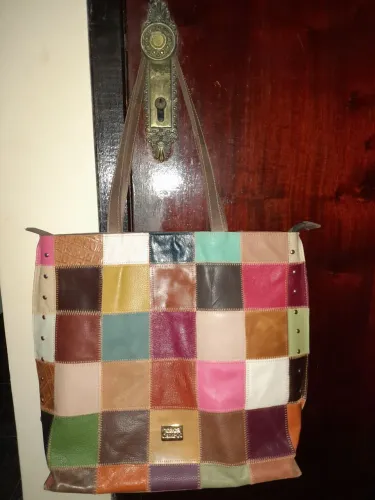 Bolsa couro legitimo.
