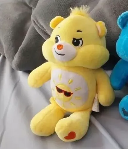 Ursinho carinhoso Cacaushow amarelo