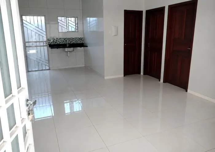 Apartamento 2 quartos sala cozinha integrada banheiro área de serviço