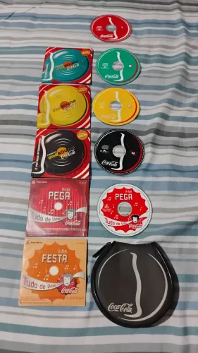 Cd coca cola com porta CD 