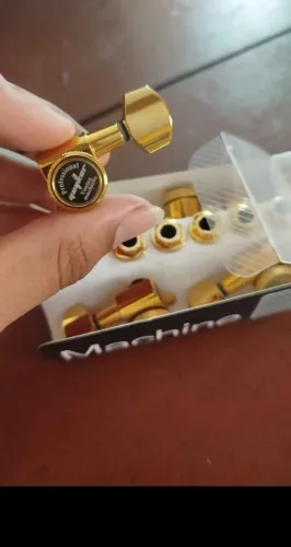 Tarraxa com trava guyker dourada