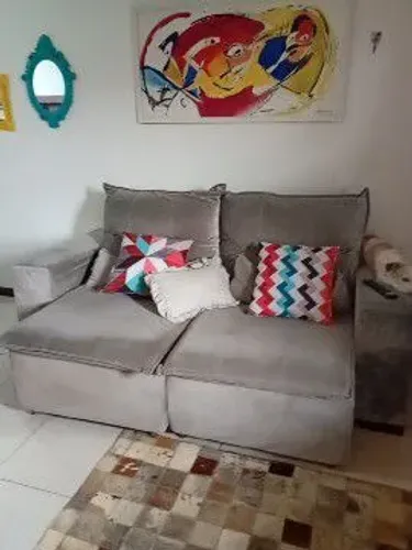Vendo SOFÁ retrátil em estado de novo.