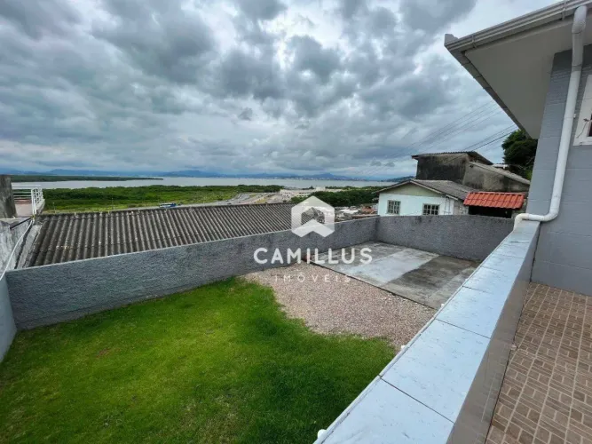 Casa vista mar com 3 dormitórios à venda, 150 m² por R$ 610.000 - Costeira do Pirajubaé -
