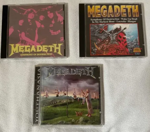 colecao CDs rock megadeth metallica maiden slayer heavy metal sabbath ozzy 