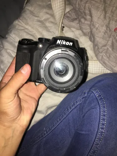 VENDO NIKON 400,COM BATERIA E CARREGADOR