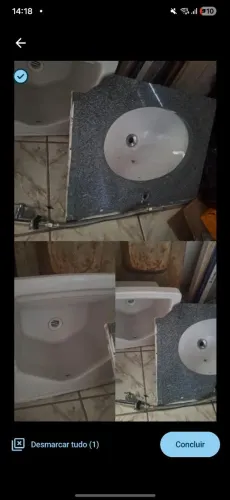 Pia da cozinha e tanquinho de parede.