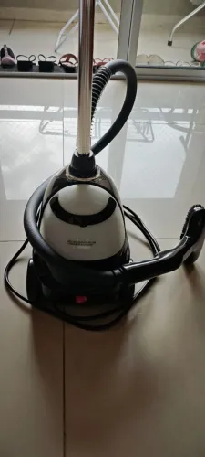 Vaporizador de roupas e tecidos
