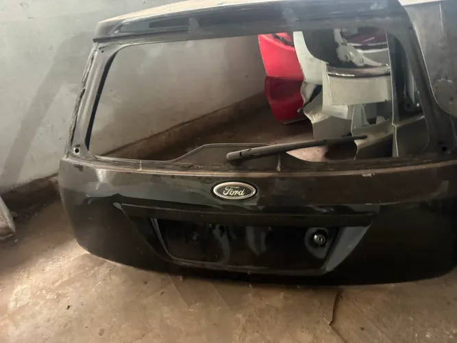 TAMPA TRASEIRA FORD FIESTA