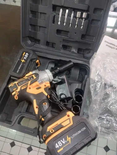 Chave de impacto tira roda de carro moto parafusa e desparafusa .