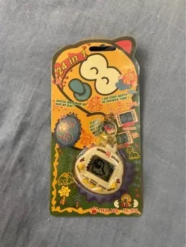 tamagotchi dinkie dino