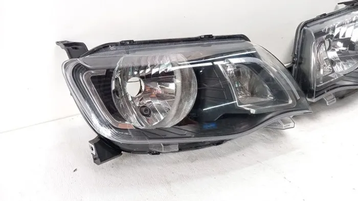 Farol renault kiwid 