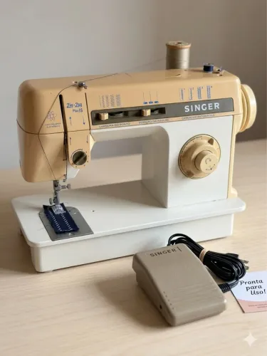 Máquina de costura Singer ótima