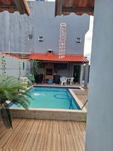 Casa itanhaém com piscina pe na areia
