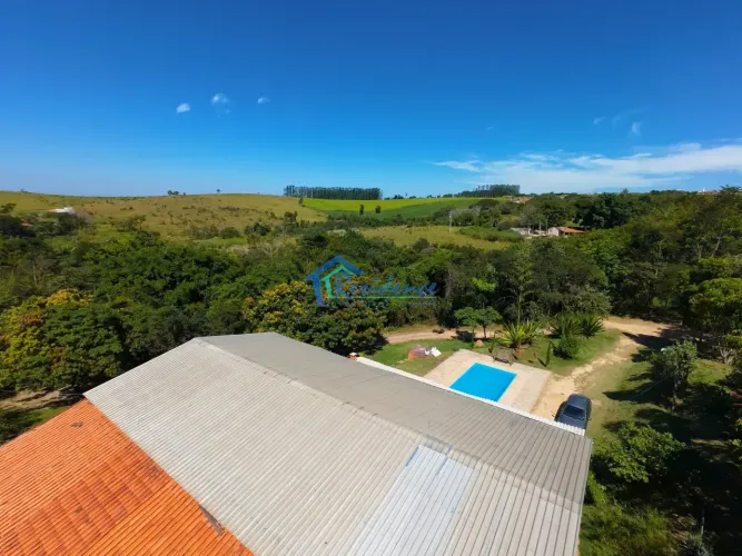 Chácara à venda, com 64 mil metros, contendo 04 casas, duas delas com Piscina, 02 lagos, á